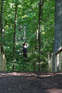 Kait landing from zipline