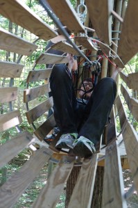 Nate going through wooden tube