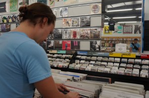 Cam looking at records